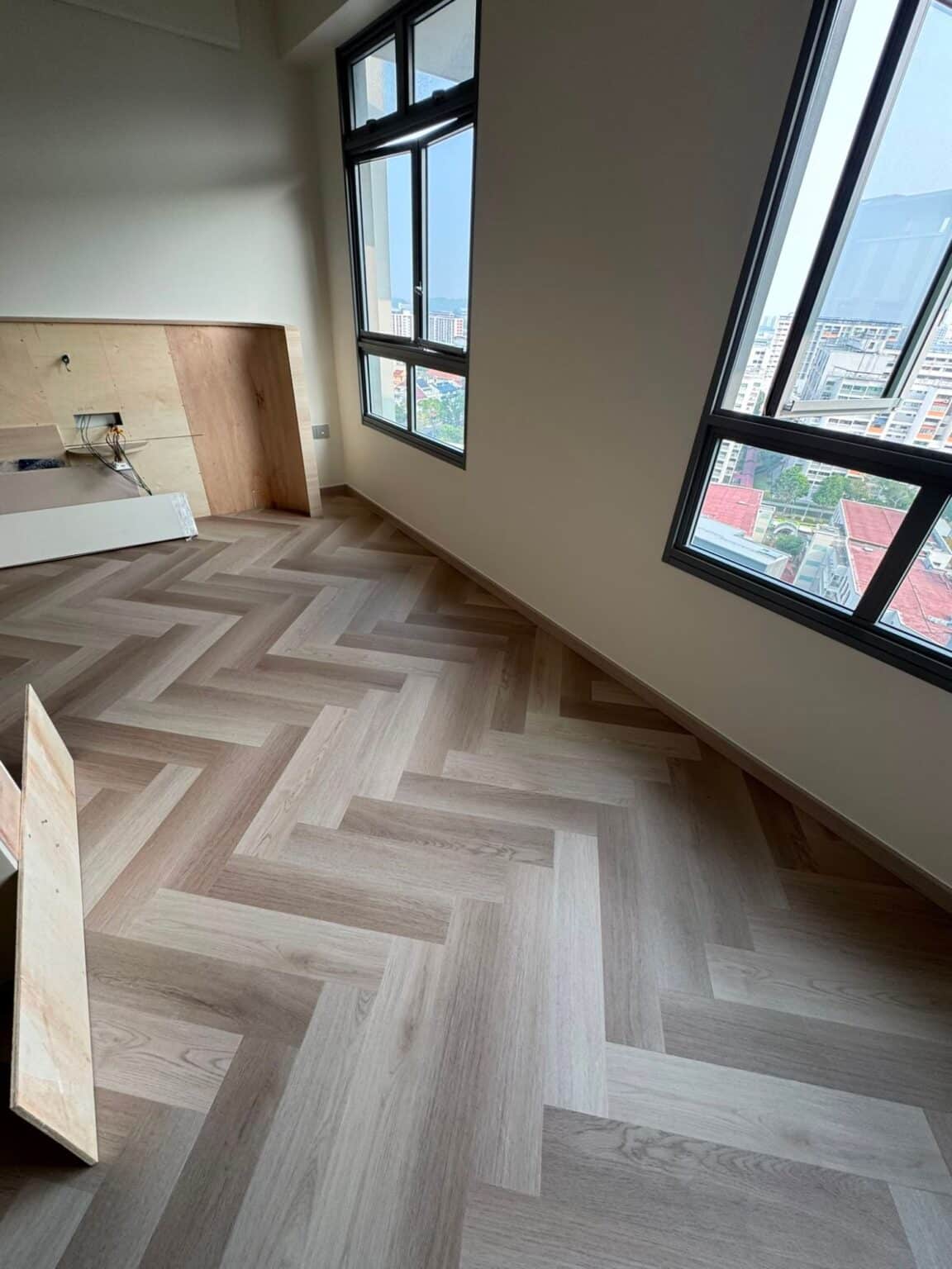 Carrera Oak IN 04 herringbone vinyl flooring in a living room, 216 Tampines Road