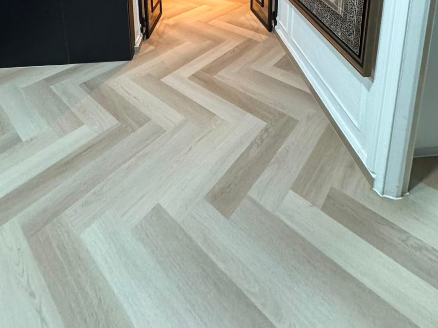 Carrera Oak herringbone vinyl flooring in a hallway