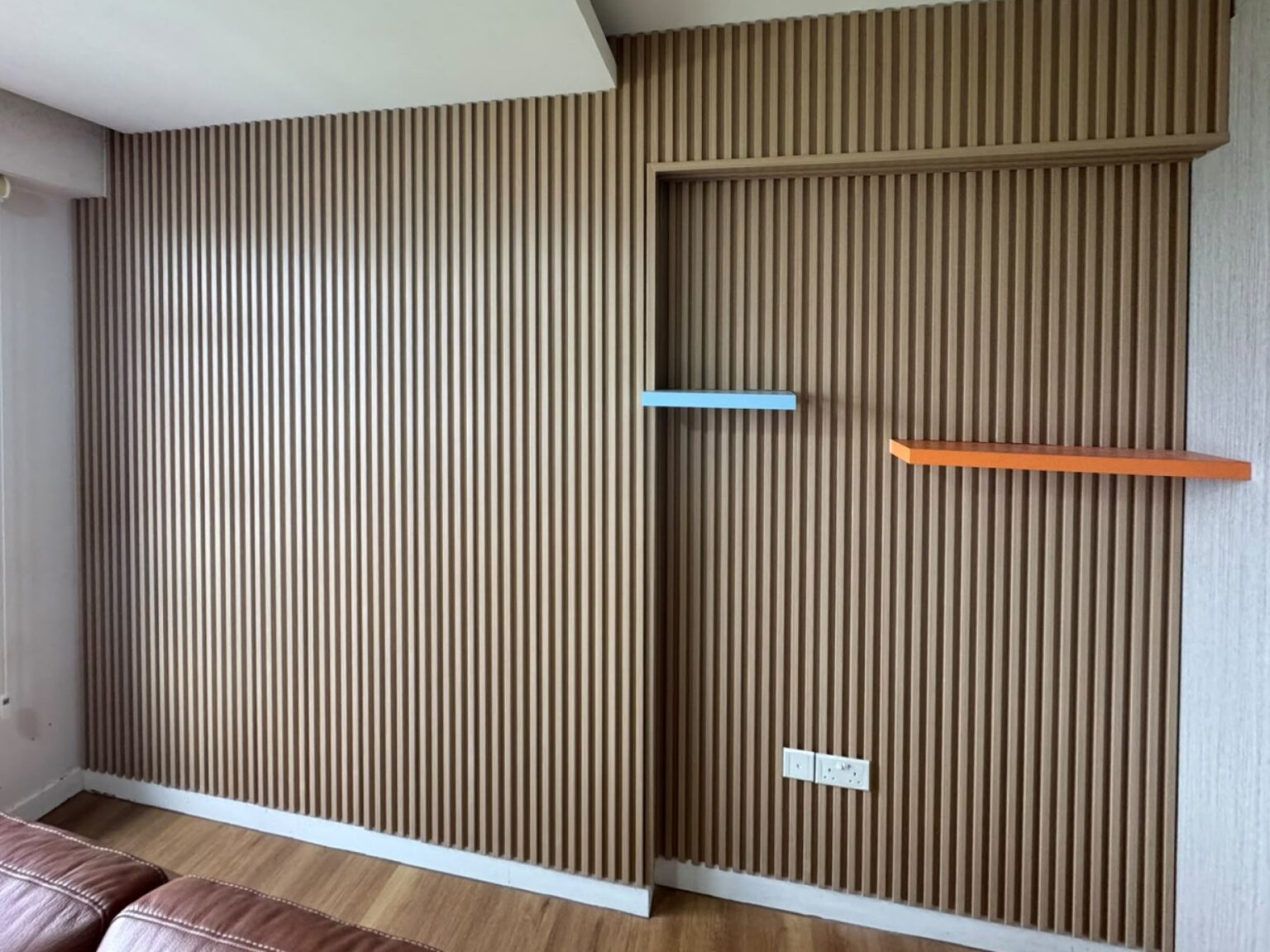 Fluted panel study wall with floating shelves