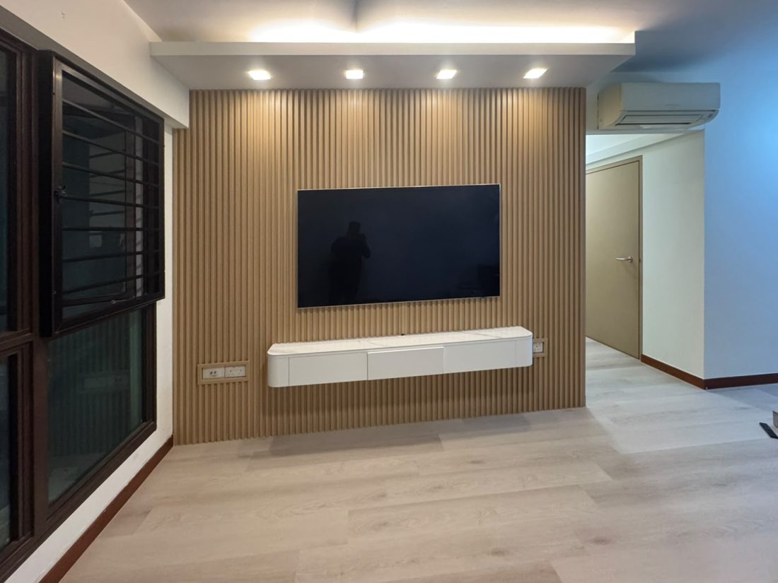Almond fluted panel TV wall with a floating console