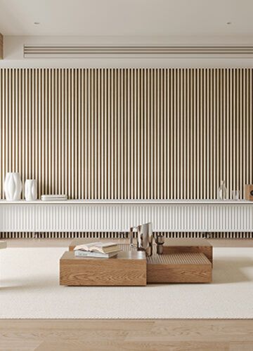 Fluted wall panels behind a low sideboard in a living room