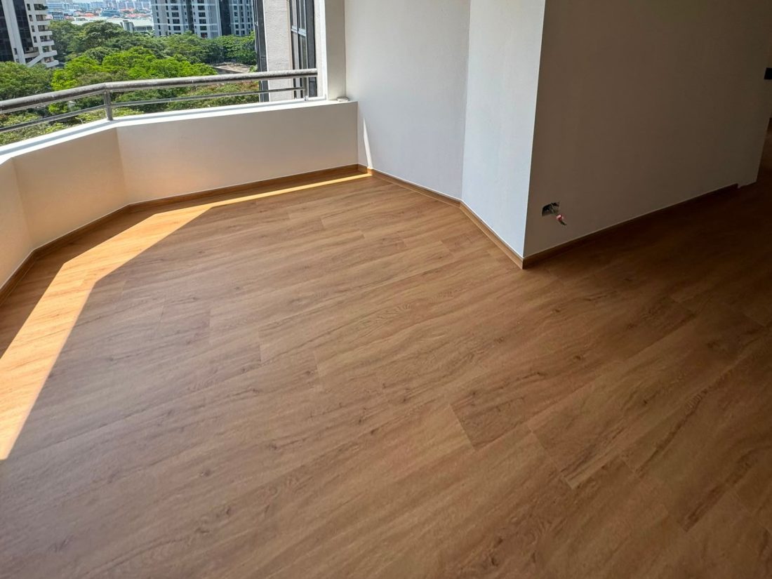 Moonbeam Oak vinyl flooring on a condo balcony with a city view